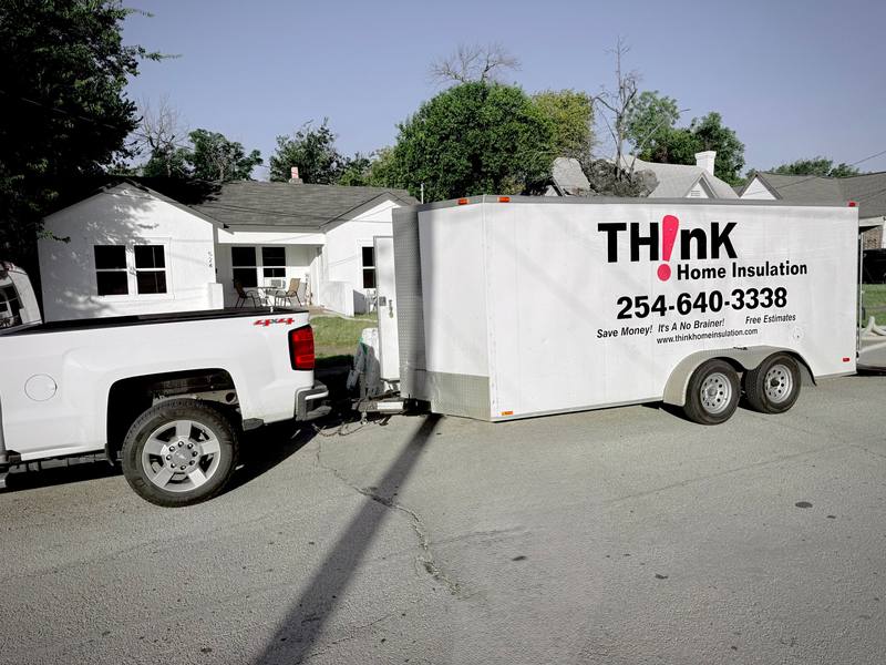 Think Home Solutions truck and trailer at a Central Texas home